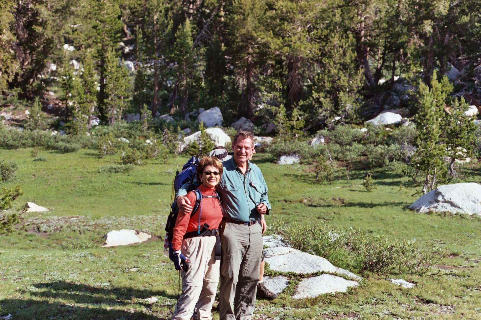 A smiling George and
Zo in the meadow.